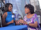 Diana Lewis and her daughter doing a retirement newscast at The Woodward Dream Cruise